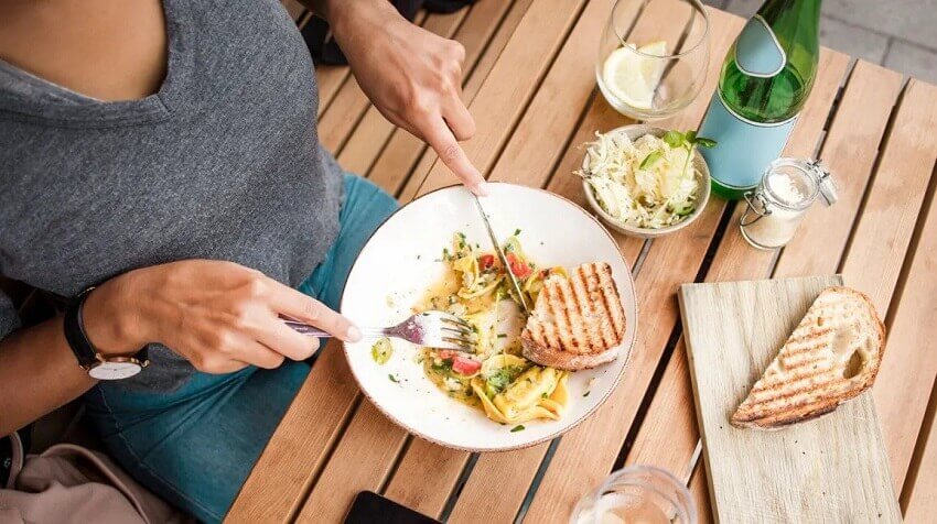 High-angle-view-of-woman-having-lunch
